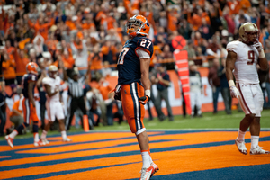 Running back George Morris II celebrates after scoring his first career touchdown