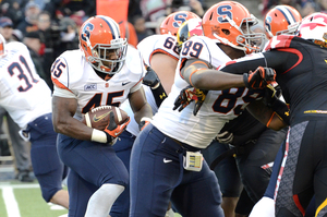 Jerome Smith powers through the Maryland line. Smith carried the ball a season-high 28 times for 118 yards and both of Syracuse's touchdowns.