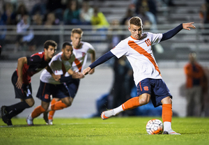 Julian Buescher unloads his second goal of the Oct. 20 game against Hartford. His penalty-kick goal put SU up 2-1. 