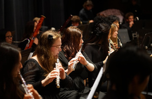 Students involved with The Syracuse Orchestra preform at a concert. The orchestra and other nonprofit organizations provide instruments and music classes to children without access to music education. 