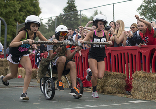 Team Delta Gamma runs by its supporter's section.  