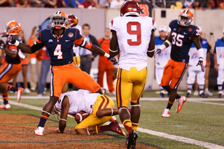 Syracuse Orange cornerback Brandon Reddish #4 reacts after USC Trojans wide receiver Robert Woods #2 scores a touchdown.  