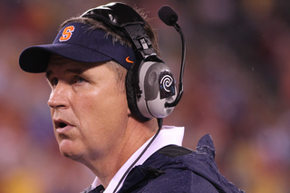 Syracuse head coach Doug Marrone watches his defense after they gave up a touchdown. 