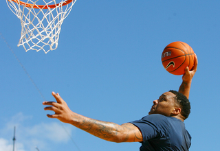 DaJuan Coleman of the Syracuse Orange dunks the ball during media day on Nov. 10, 2012 before the Battle on the Midway game against the San Diego State Aztecs.