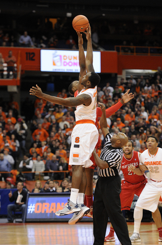 Rakeem Christmas fights for the opening tip.