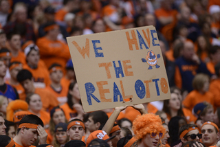 Some of the on-campus record 35,012 in attendance flash a sign in support of the Orange. Georgetown's star Otto Porter dropped 33 points on SU in the Georgetown victory.