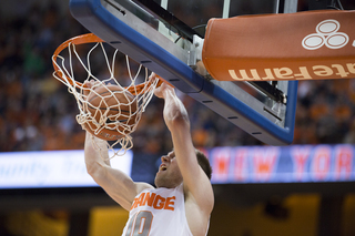 SU guard Trevor Cooney goes up for a dunk. His inside scoring was better than his shooting from the outside, where he connected on just two of his 12 3-point attempts. 