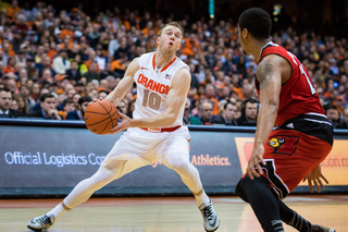 Cooney looks up at the rim while preparing to make a move. He finished only 1 -of-10 from the field and played all 40 minutes.