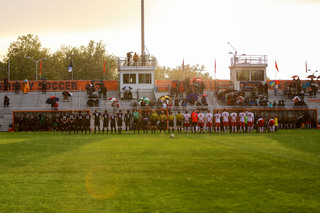 It was partly sunny at the start of the game, but rain came during the game.