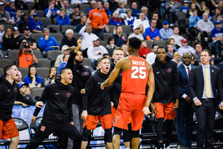 Battle celebrates with the bench after an and-one. He shot just 1-of-3 from the free-throw line, though. 